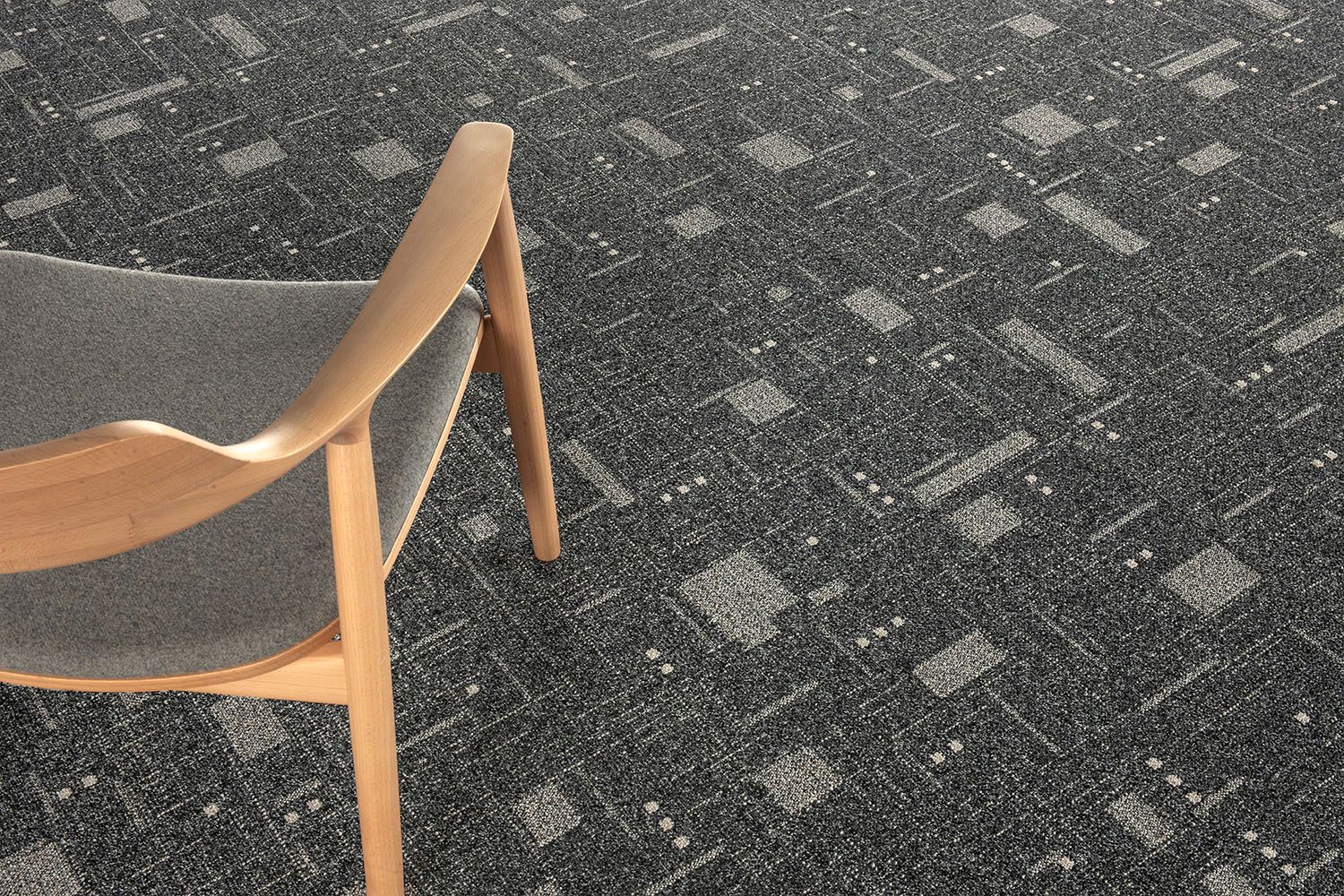 Detail image of Interface DL903 carpet tile with chair image number 3